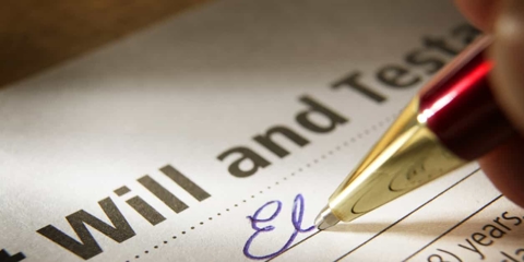 Signing a last will and testament.